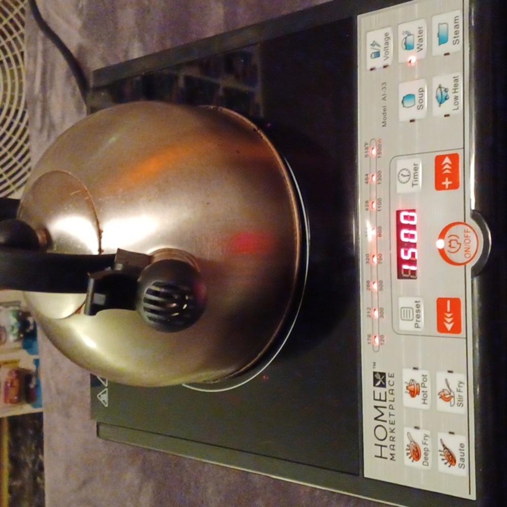 Push button induction cooker - Picture 7 of 11